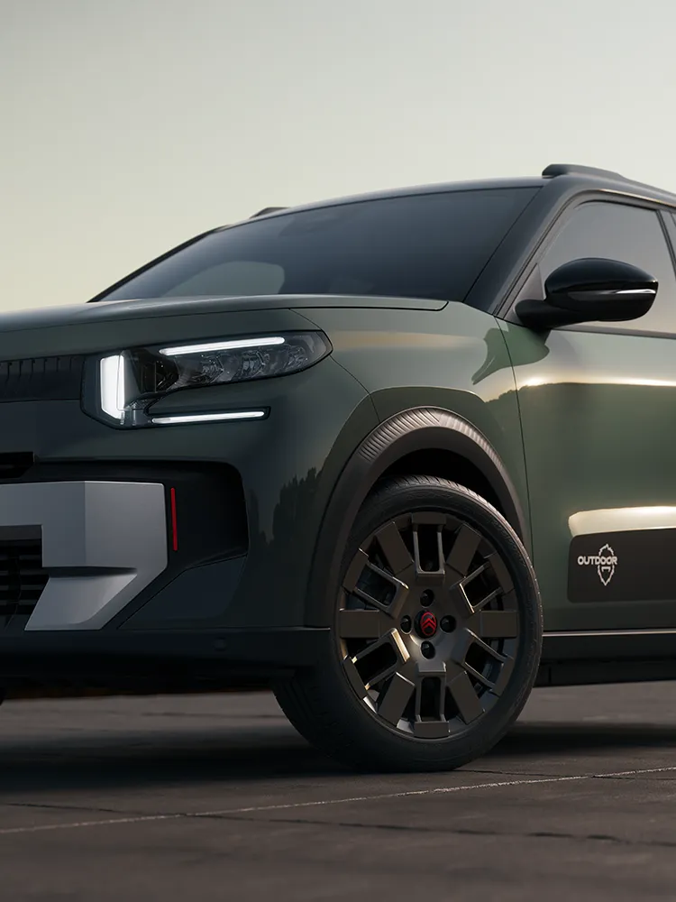 Vue rapprochée de l’avant de la Citroën C3 Outdoor mettant en valeur la jante alliage et la signature lumineuse LED, illustrant le SUV compact Advanced Comfort.