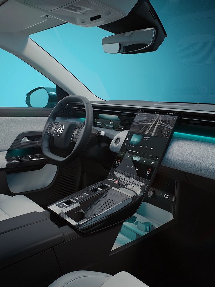 Vue intérieure côté conducteur de la Citroën C5 Aircross Émeraude mettant en avant l’écran Waterfall de la C5 Aircross et le poste de conduite, illustrant le confort et la praticité d’un SUV familial connecté.