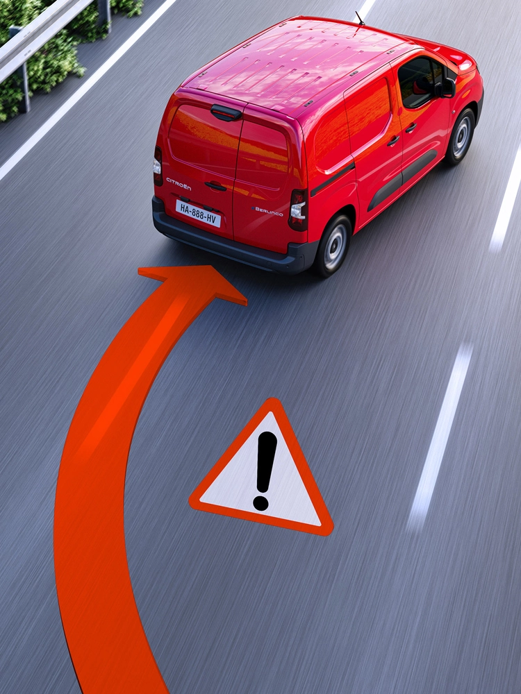 Vue arrière d'un Berlingo Van déviant de sa voie, avec l'alerte de sortie de voie affichée sur la route.