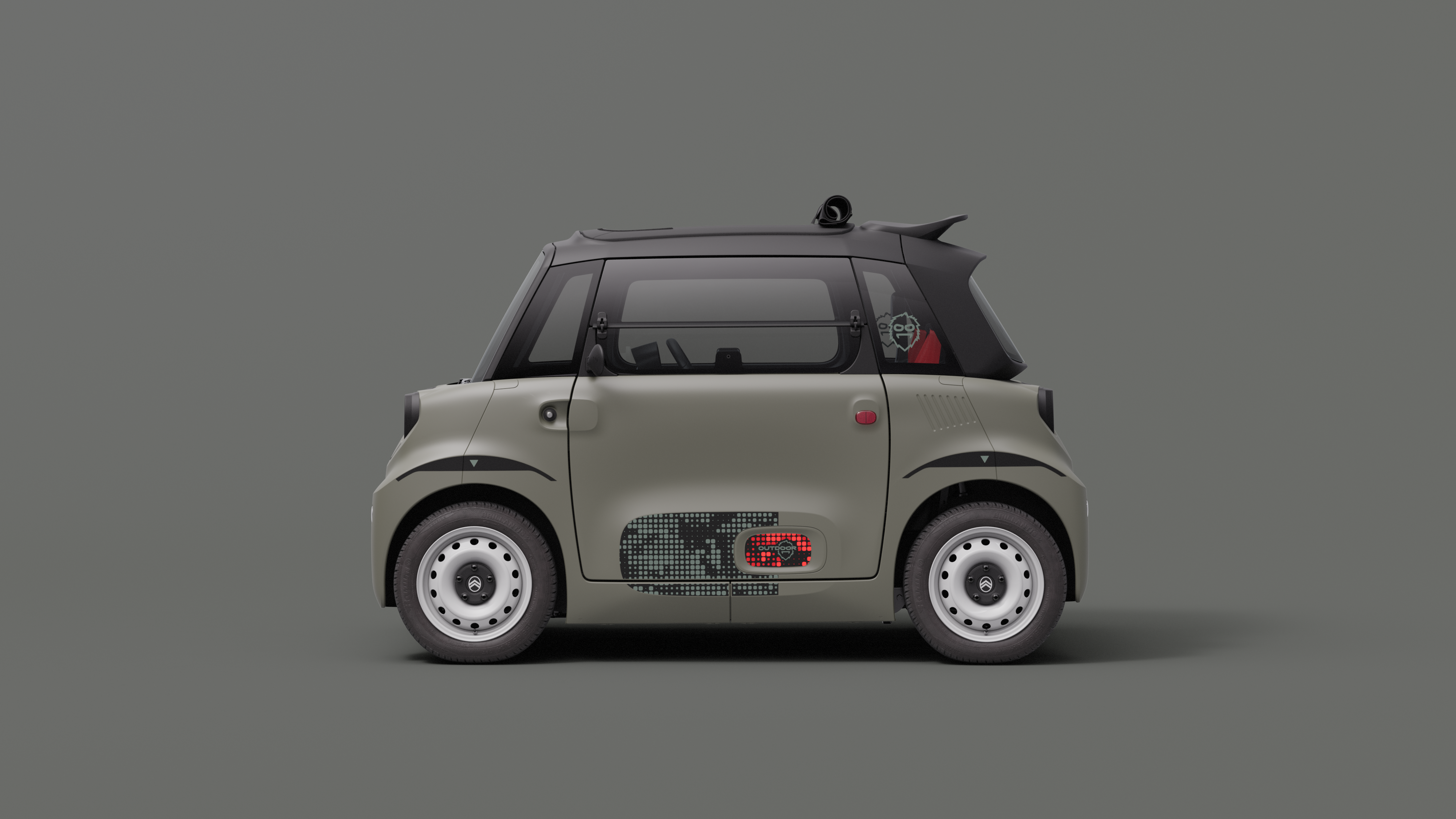 Vue de profil de Citroën ami Outdoor avec toit ouvrantmontrant la voiture électrique urbaine ultracompacte facile à stationner
