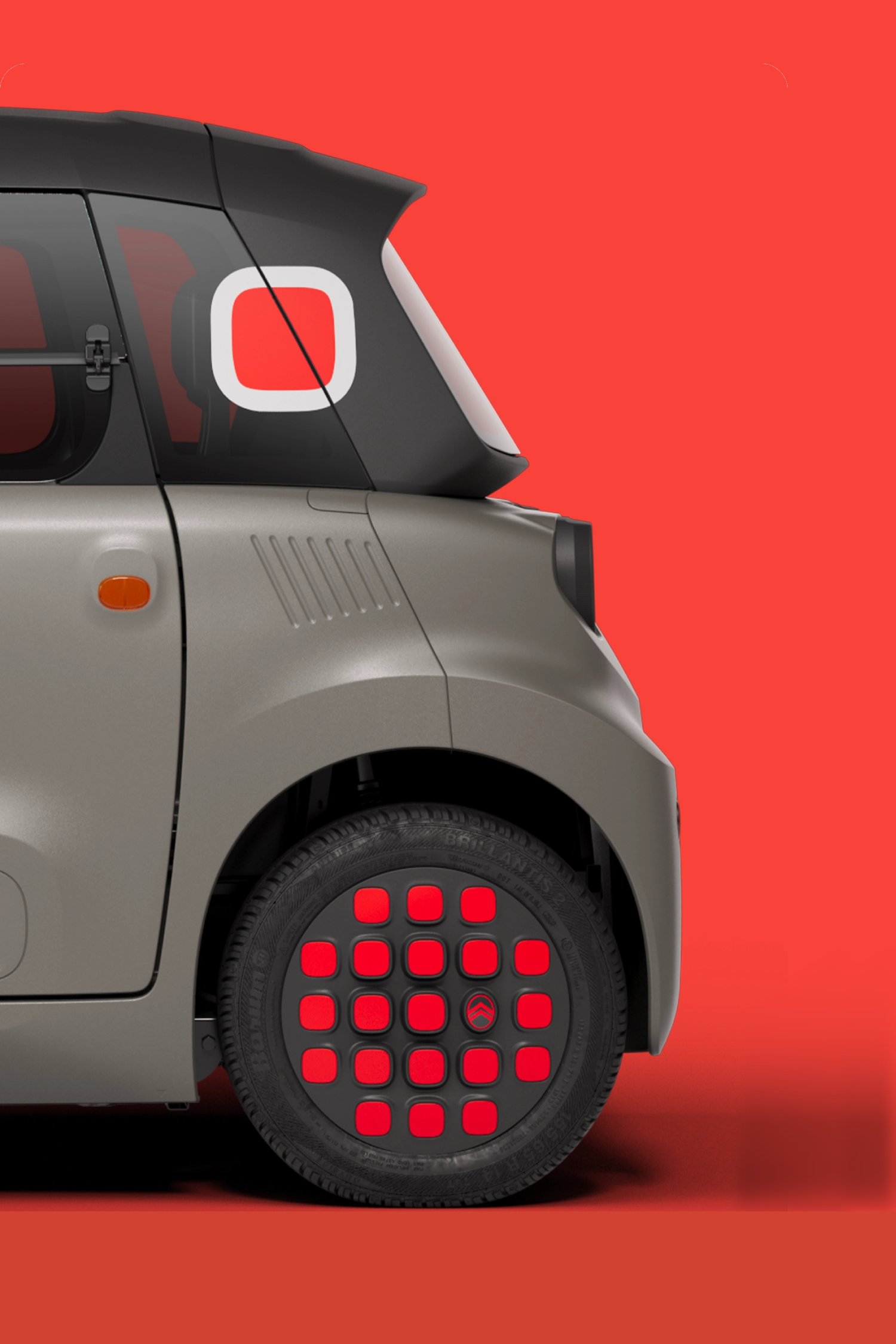 Vue arrière latérale de Citroën ami Spicy, qui présente un design compact et sûr offrant une liberté de mobilité innovante.