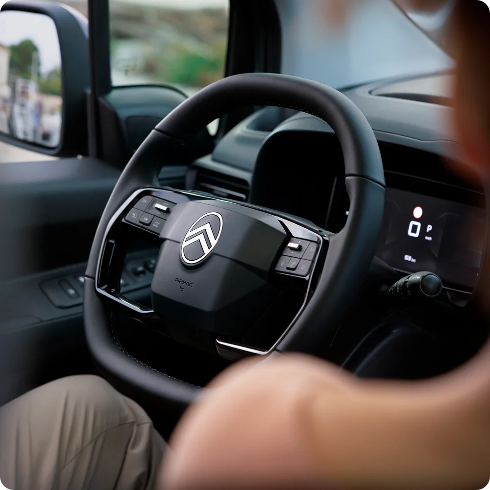 Driver‑view Berlingo showing onboard technology, connectivity, safety and enhanced modern driving comfort