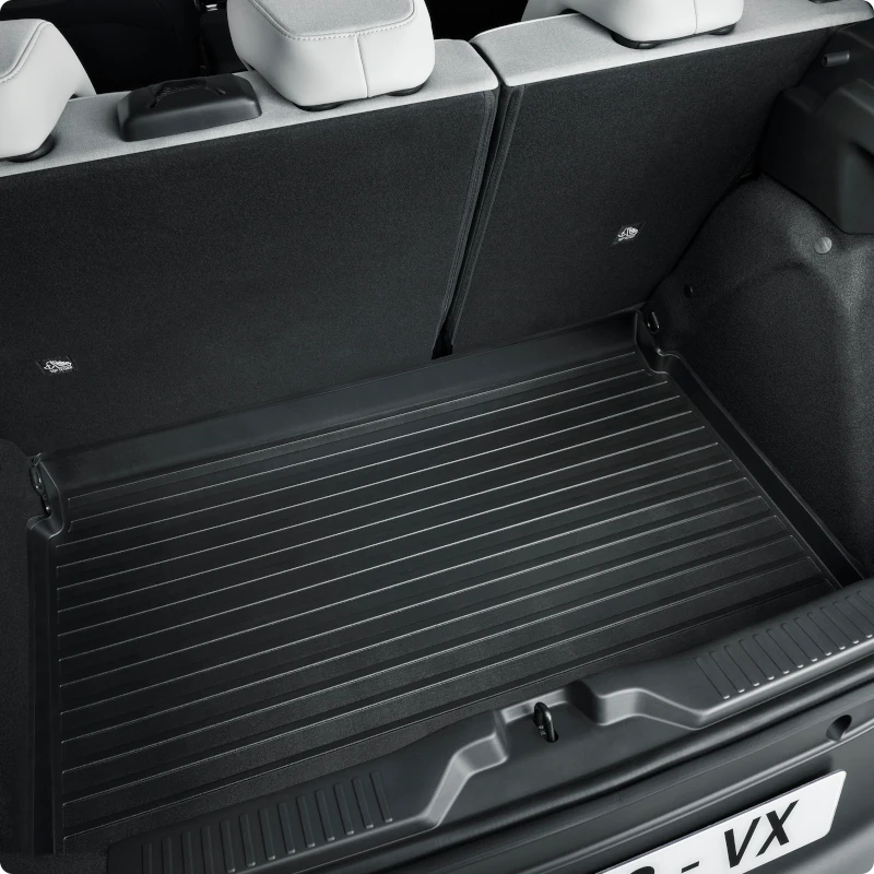 Gros plan le bac de coffre de ë-C3, sa conception thermoformée protectrice pour une utilisation, durable et facile à nettoyer.