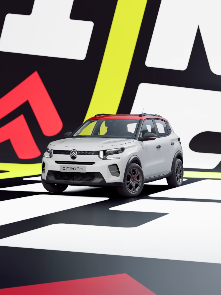 Vue de trois quarts avant de ë-C3 TONIC édition limitée, voiture électrique urbaine : allure dynamique et graphisme, alternative EV intelligente