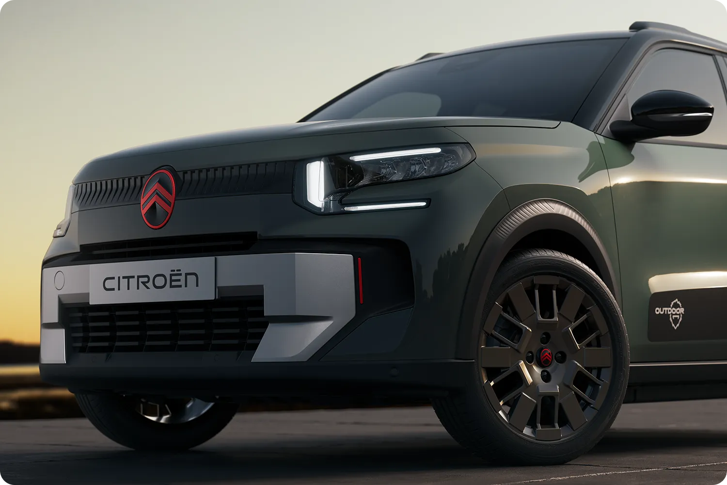 Gros plan sur la roue avant de la Citroën C3 Outdoor, au design robuste, polyvalent et confortable, avec un style innovant pour les trajets du quotidien.